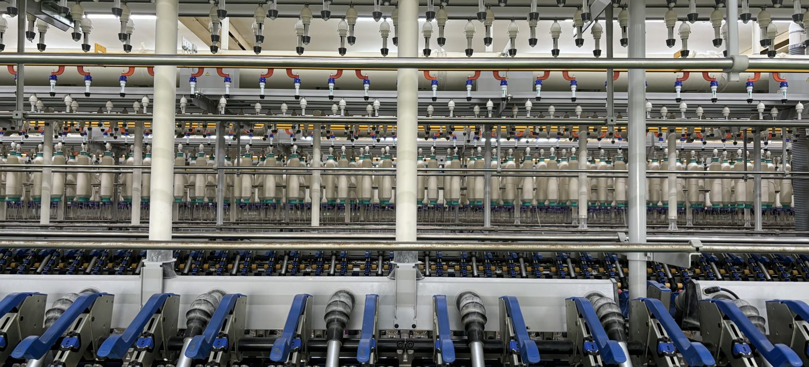 Spinning frames inside a modern textile mill